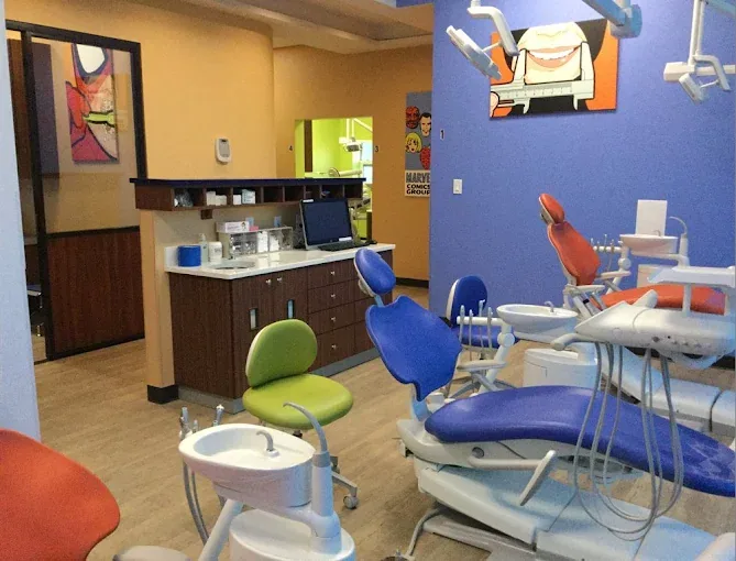 Colorful pediatric dental operatory with Marvel theme
